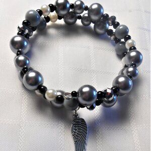 Handmade jewelry set with memory wire bracelets and asymetrical earrings